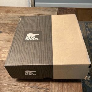 Sorel waterproof boots; New in box.